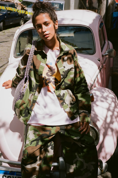 Model wearing the oversized Camuffare Cin Shirt, showcasing the loose silhouette and 68cm length designed for easy layering.