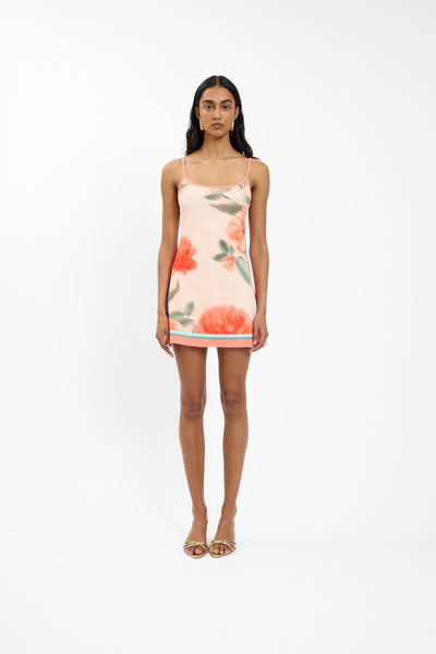 A full-length front studio profile of the mini dress on a model, showcasing how the fabric cinches smoothly at the mid-waist and flows out into a feminine A-line mini skirt.