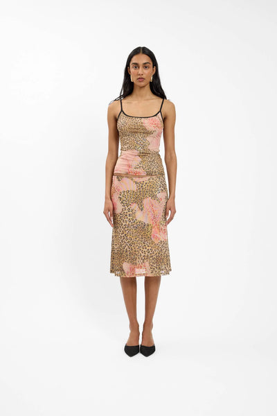 A front-facing studio shot of a model wearing the form-fitting With Harper Lu Midi Skirt in Mesh Leopard, paired with the matching camisole to showcase the full co-ord set aesthetic.