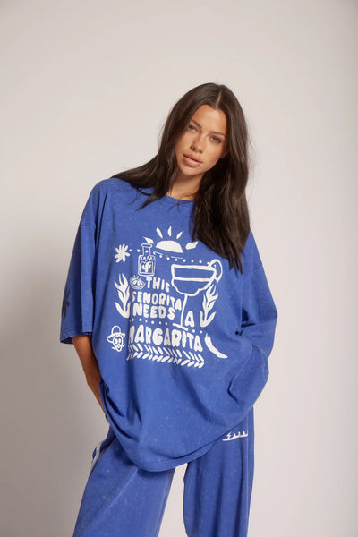 Front view of a model wearing Sabbi The Very Oversized Margie Tee in Royal Blue styled with matching blue sweatpants.