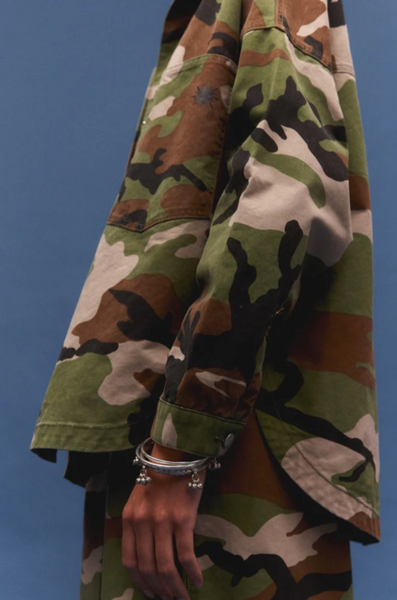 A versatile camouflage print button-down shirt with a laid-back feel, perfect for trans-seasonal styling and everyday wear.