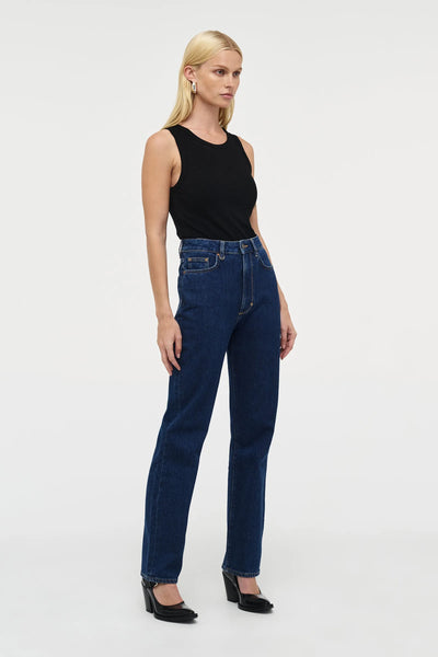 A full-length shot of the Nico jean, illustrating the straight-cut leg from the hip down to the 42cm hem for a timeless aesthetic.