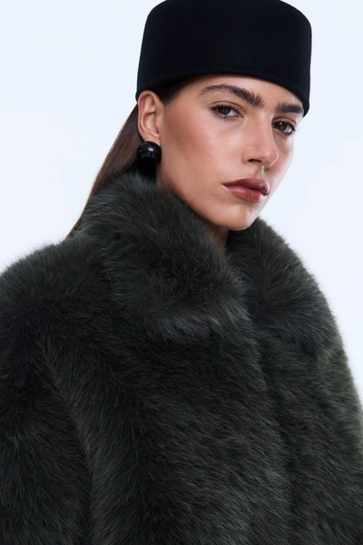 A close-up of the olive recycled faux fur, highlighting the plush, high-pile texture and the subtle "bubble" effect of the fabric.