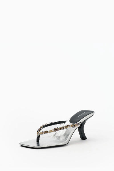 Three-quarter view of the Alias Mae Teya slide sandal in Silver Crinkle Leather, showcasing the curved stacked black heel and embellished straps.