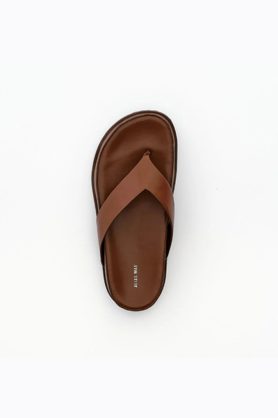 Top-down view of the cocoa brown leather Wallace sandal, showing the rounded toe, wide thong strap, and the "ALIAS MAE" brand logo printed on the insole.