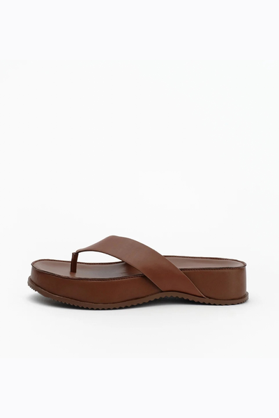 Side profile view of the cocoa brown leather flatform sandal, showcasing the even height of the 40mm platform and the wrapped sole design.