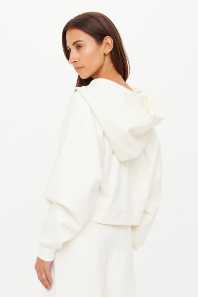 A detailed rear shot highlighting the structure of the hood and the continuation of the contrast mocha stitching along the seams.