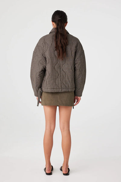 A rear view of the jacket highlighting the quilted Espresso Check pattern and the slouchy, cocoon-shaped silhouette. The drawstring ties are visible at the side hem.