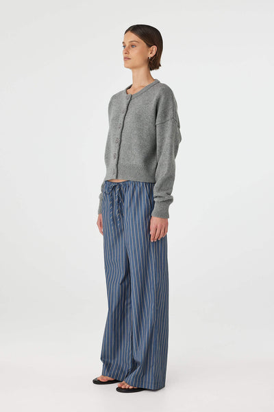 Side profile highlighting the lightweight, breathable drape of the 60% cotton and 10% Merino wool fabrication.