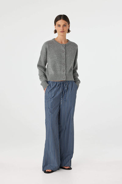 Model wearing the Bobby Cardigan, illustrating the "off-body" relaxed shape, dropped shoulders, and effortless layering potential.