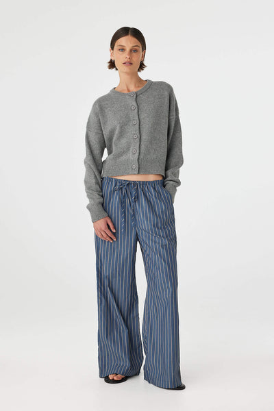 Model wearing the Bobby Cardigan, illustrating the "off-body" relaxed shape, dropped shoulders, and effortless layering potential.