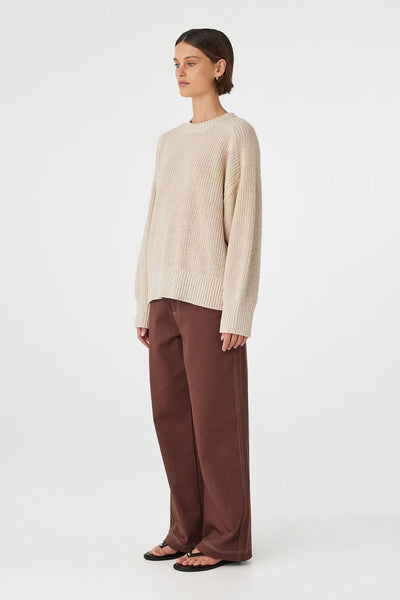 Oversized Solene Sweater in a chunky Cream and Sand mottled knit, featuring a relaxed drape and classic ribbed crew neckline.