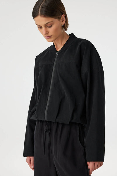 Close-up of the 100% cotton outer shell, highlighting the smooth, matte black finish and the durable, high-quality weave.