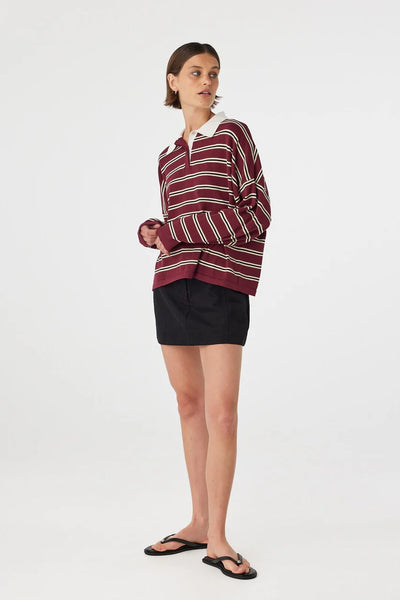 Model wearing the Rayne knit, illustrating the intentional "off-body" shape created by the dropped shoulders and wide-cut body.