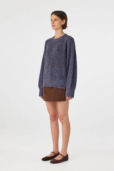 A clean front-view focusing on the sweater bodice, showcasing the easy drape through the body and the balanced proportions of the casual design.