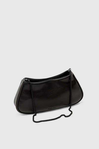 Studio product view of the Brie Leon Iris Mini Bag in black smooth recycled PU resting on a white background with its matte black fine chain strap draped forward.