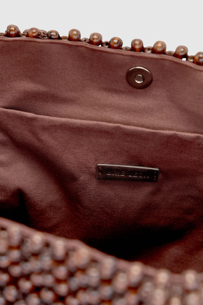Close-up interior view of the tote bag showing the dark brown recycled cotton twill lining, magnetic snap closure, internal patch pocket, and "Brie Leon" branded metal tag.