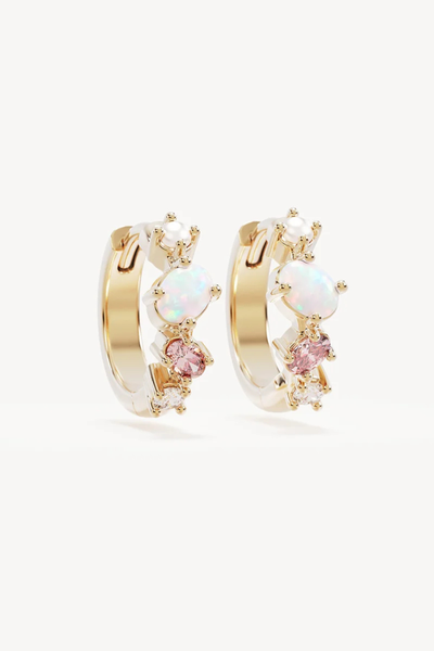 Studio product shot of the By Charlotte Cosmic Bloom Hoops in 18k Gold Vermeil, showing a pair of huggie hoops set with freshwater pearl, lab-grown opal, pink cubic zirconia, and white cubic zirconia.