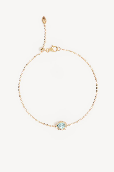 18k Gold Vermeil Dive Deeper Bracelet arranged in a delicate circle on a plain white background, highlighting its secure lobster clasp, adjustable chain with a silicon ball slider, and a central organic teardrop-shaped pendant featuring a mint green tourmaline gemstone accented with cubic zirconias.