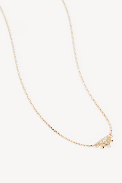A full studio product image showcasing the 18k Gold Vermeil Lotus Rain Necklace resting on a clean white background, highlighting its signature fine chain and the distinct semi-circular, textured fan pendant set with sparkling cubic zirconias.