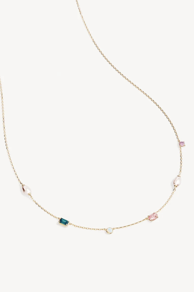Studio product shot of the By Charlotte You Are Infinite Choker in 18k Gold Plated, featuring a delicate diamond-cut cable chain set with freshwater pearls, amethyst, nano tourmaline paraiba, pink cubic zirconia, and lab-grown opal.