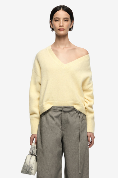 Model wearing the Campbell jumper, illustrating the "slouchy" oversized fit and how the cropped hem sits perfectly above the waistline.