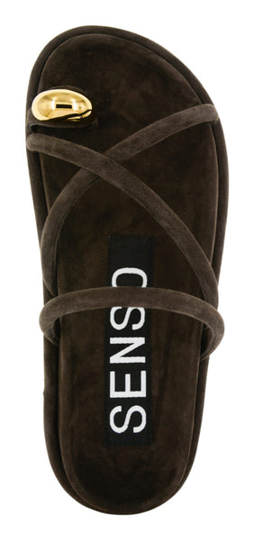 A vertical overhead view focusing on the contoured leather footbed, demonstrating the symmetric layout of the toe loop, diagonal straps, and clean edge-molding.