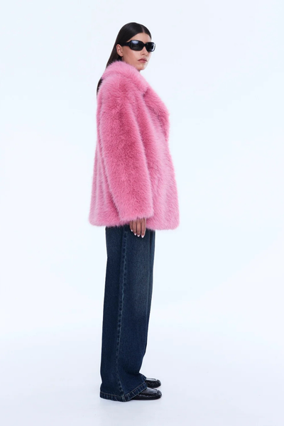 A three-quarter length front portrait focusing on the jacket's upper bodice, illustrating how the heavy faux fur collar sits when the mid-length jacket is worn open or slightly draped over the shoulders.