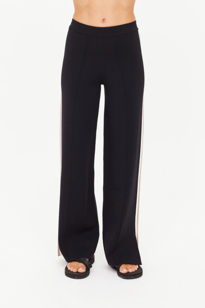 A front view of the Freya Knit Pant in black, showcasing the clean straight-leg silhouette and the smooth finish of the viscose-nylon blend.