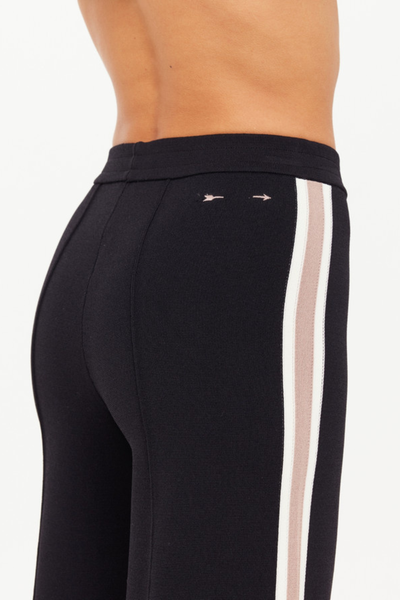 A detailed shot of the rear waistband, featuring the signature embroidered arrow logo in mocha for a tonal branding touch.