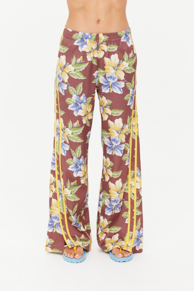 Full front view of the Isla Juliet Pant, demonstrating the drape of the wide-leg cut and the consistent application of the vintage Isla hibiscus design.