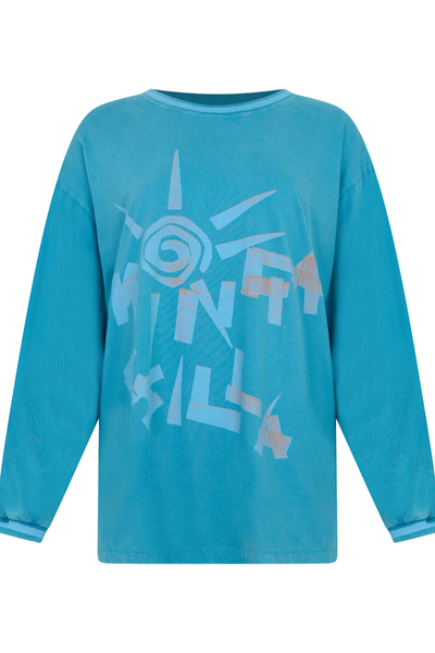 Front flat lay product view of the Kinga Csilla Paper Sun Roses Tee in washed blue, showcasing the hand-drawn sun motif and abstract brand lettering.
