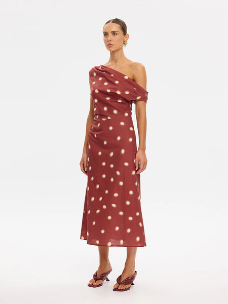 A waist-up product shot focusing on the midsection details, highlighting the tailored, close-to-body fit through the bodice and the delicate gathering at the side waist.