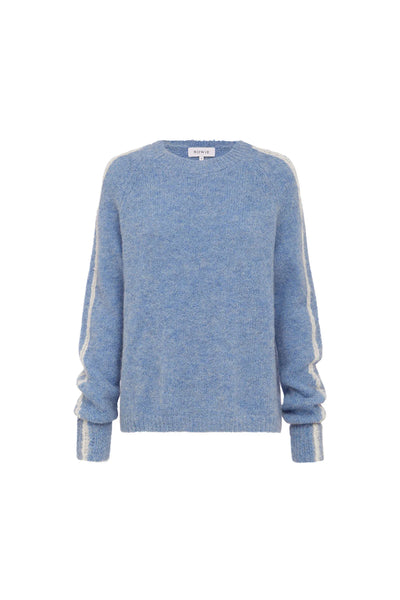 The contrast abstract stripe detailing along the sleeves, adding a subtle graphic element to the soft blue knit.
