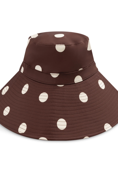 A detailed close-up shot focusing on the under-brim construction, highlighting the 32cm strap length of the slender fabric self-ties and the premium quality of the matching tonal topstitching.