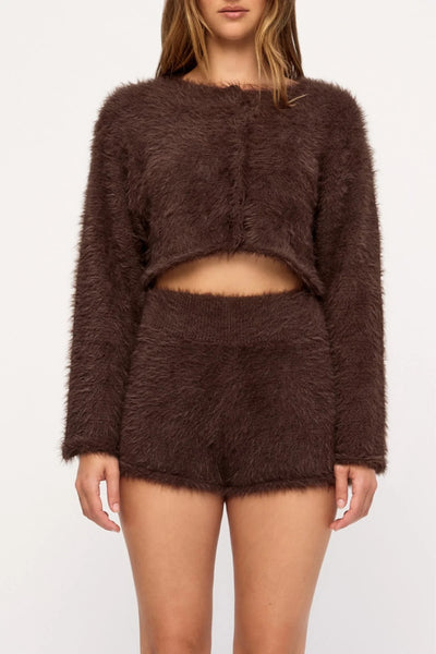 Close-up studio view highlighting the textured recycled nylon fabric of the Zulu & Zephyr Fully Knit Cardigan in Chocolate paired with matching fluffy shorts.