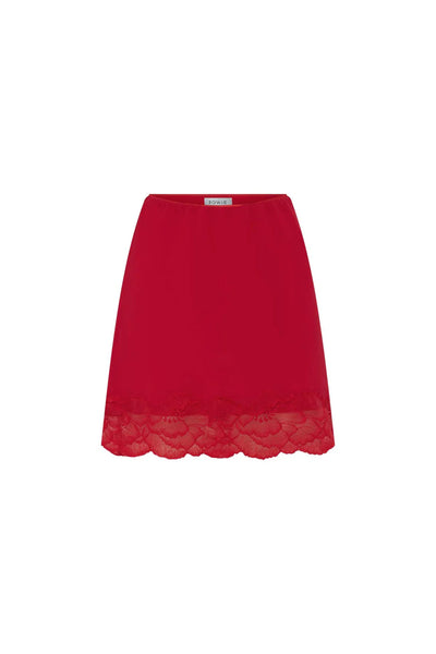 Ghost mannequin display of the ROWIE Marina Silk Mini Skirt in Flame Red on a plain background, featuring the bias-cut mini silhouette and delicate scalloped lace hem.