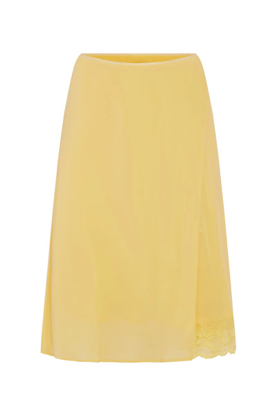 Ghost mannequin front product shot of the lemon silk crepe midi skirt with asymmetric seam detailing against a neutral white background.