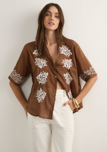 The Rosalie Blouse in Cocoa is an effortlessly romantic piece, crafted from soft cotton voile with a light, semi-sheer finish. 