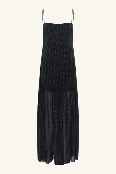 Flat studio product image of the Shona Joy Irving Polka Dot Maxi Dress in Black Polka Stripe against a cream background, featuring delicate shoulder straps and a dropped hem.