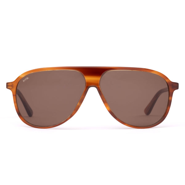 Front view of the Sito Shades Bobbi in Tangelo translucent orange acetate aviator sunglasses with dark brown CR39 lenses and a flat top brow bar on a plain white studio background.