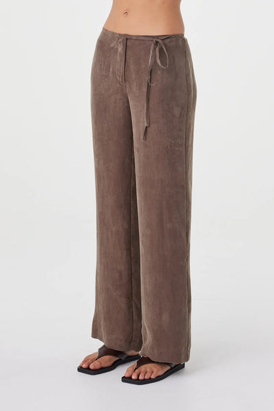 Waist-up side close-up highlighting the slim side tie accent and smooth cupro-blend texture