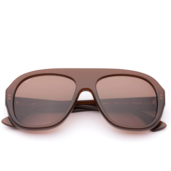 Front product view of Sito Shades Paloma milky coco aviator sunglasses folded flat, showing the interior temple arm text reading "PALOMA | MILKY COCO".