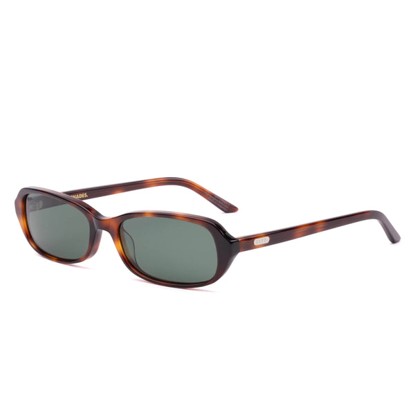 Three-quarter studio view of the Sito Shades Roux rectangular sunglasses in translucent Classic Tort acetate with dark grey polarised lenses.
