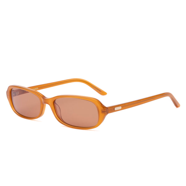 Three-quarter studio view of the Sito Shades Roux rectangular sunglasses in translucent caramel orange acetate with light brown lenses.