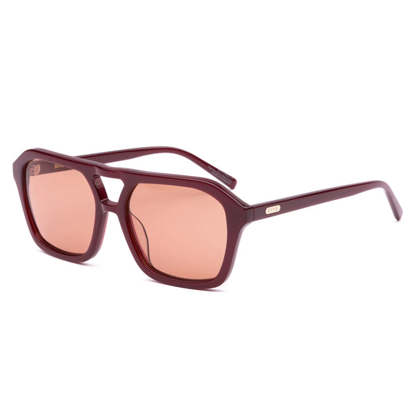 A top-down studio shot looking into the interior of the sunglasses frame with the temples fully extended. This overhead view highlights the smooth symmetry of the handcrafted plant-based acetate design, the comfortable molded nose pads, and the polished silver-toned metal temple hinges.
