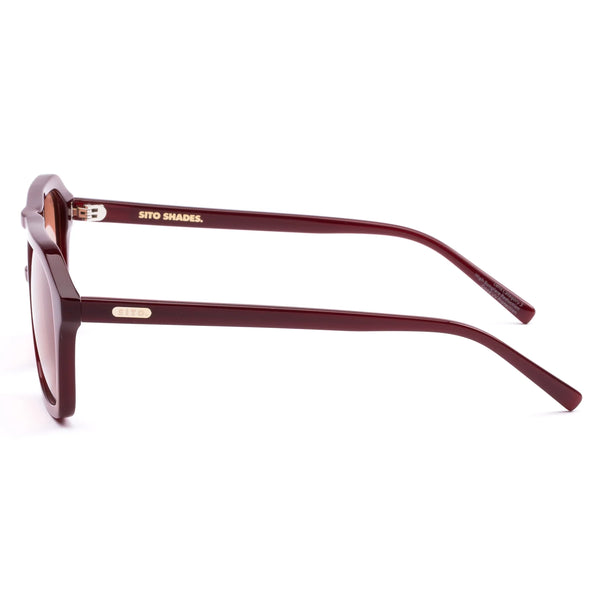 A three-quarter studio product image displaying the sunglasses angled to the right from the rear view. The layout emphasizes the internal branding details, including the gold "SITO SHADES" logo stamped along the inner temple arm, alongside the subtle "SITO" micro-branding etched onto the upper corner of the left lens.
