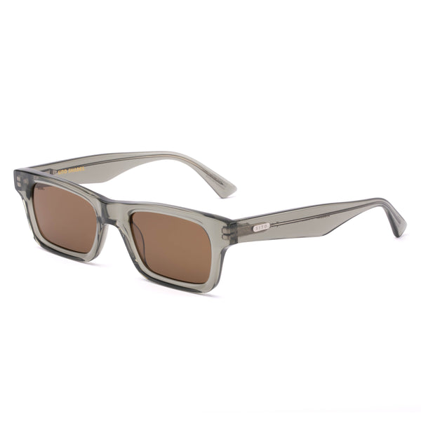 Three-quarter angle studio view of the Sito Shades Vincent rectangular sunglasses in translucent Nori green acetate with brown polarised lenses on a white background.