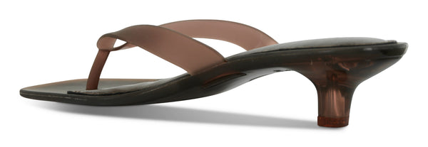 A direct rear view focusing on the heel architecture, showcasing the stable placement of the glossy 30mm rubber block heel against the streamlined sole.
