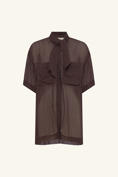 A front flat-lay product image of the Shona Joy Maddox Short Sleeve Shirt, highlighting the rich ristretto brown background with an all-over sky blue polka dot print, functional buttons, and symmetrical front chest pockets.